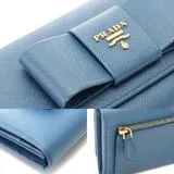 PRADA プラダ リボン ZIP長財布 ブルー サフィアーノ 1MH132【471】2148103685736