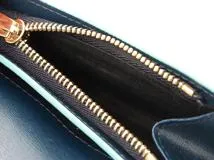 Salvatore Ferragamo　フェラガモ　ガンチーニ　コンパクトウォレット　ライトブルー/ネイビー　カーフ【433】2147300396001