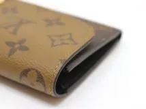 LOUIS VUITTON　ルイ・ヴィトン　財布　ポルトフォイユ・エミリー　モノグラム・リバース　M82157　2143300229851　【200】