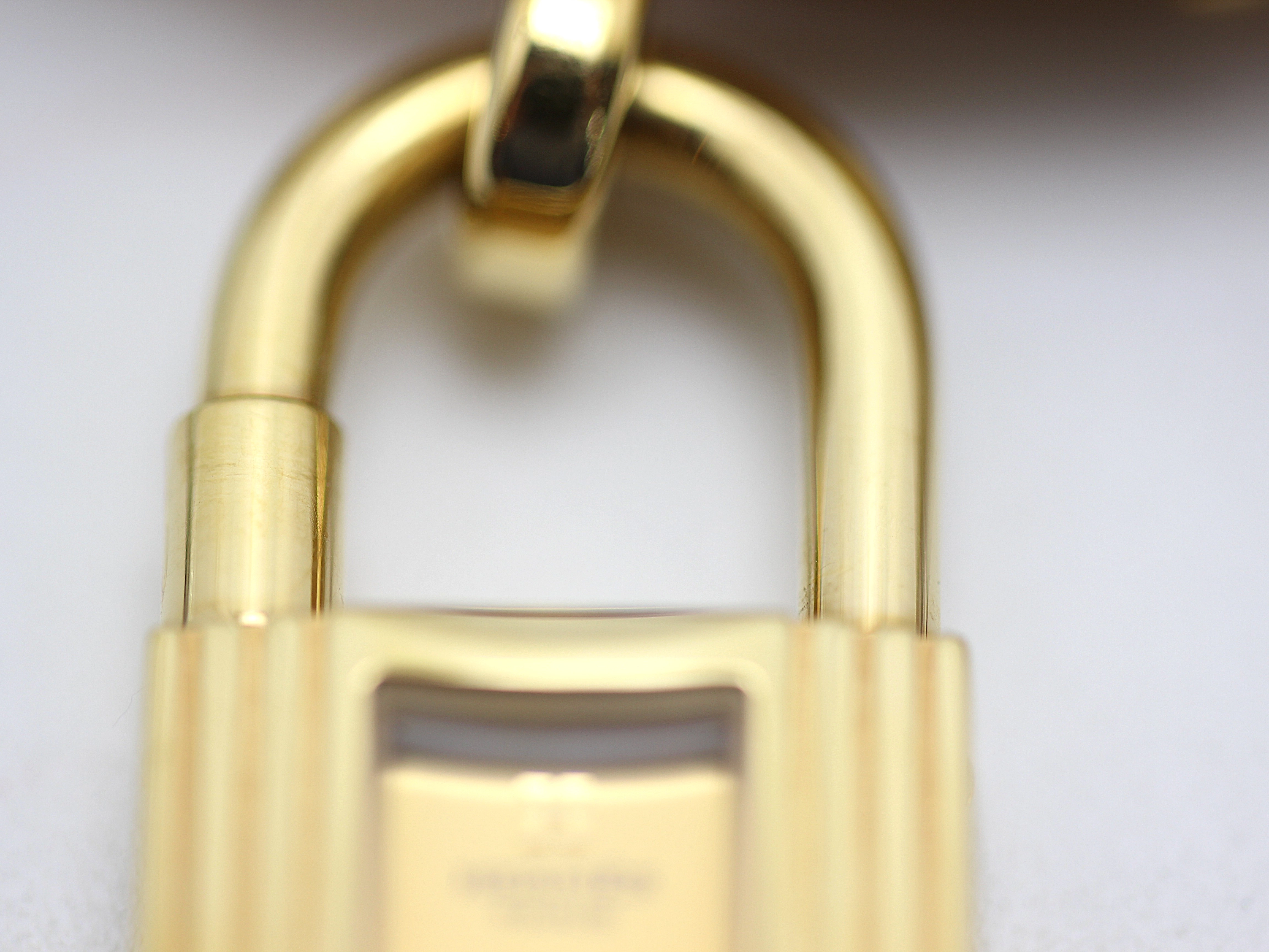 HERMES エルメス レディース腕時計 ケリーウォッチ KE1.201 ゴールドメッキ/クシュベル □C刻印 ゴールド文字盤 クオーツ【472】UH