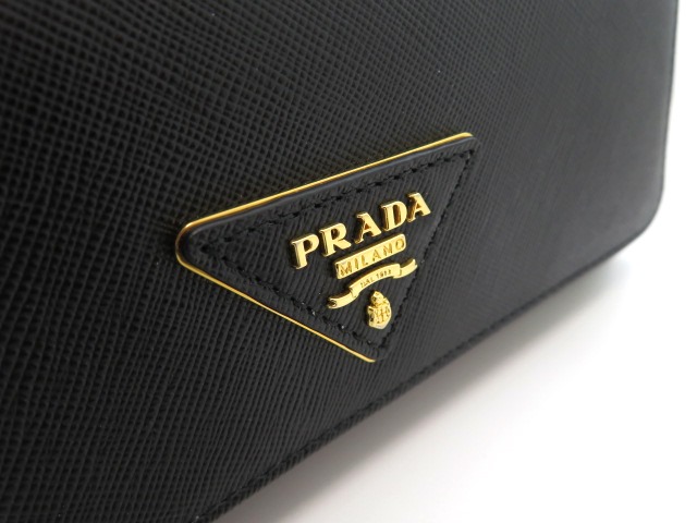 PRADA プラダ 二つ折り長財布 サフィアーノ ブラック1M1132【473】 の